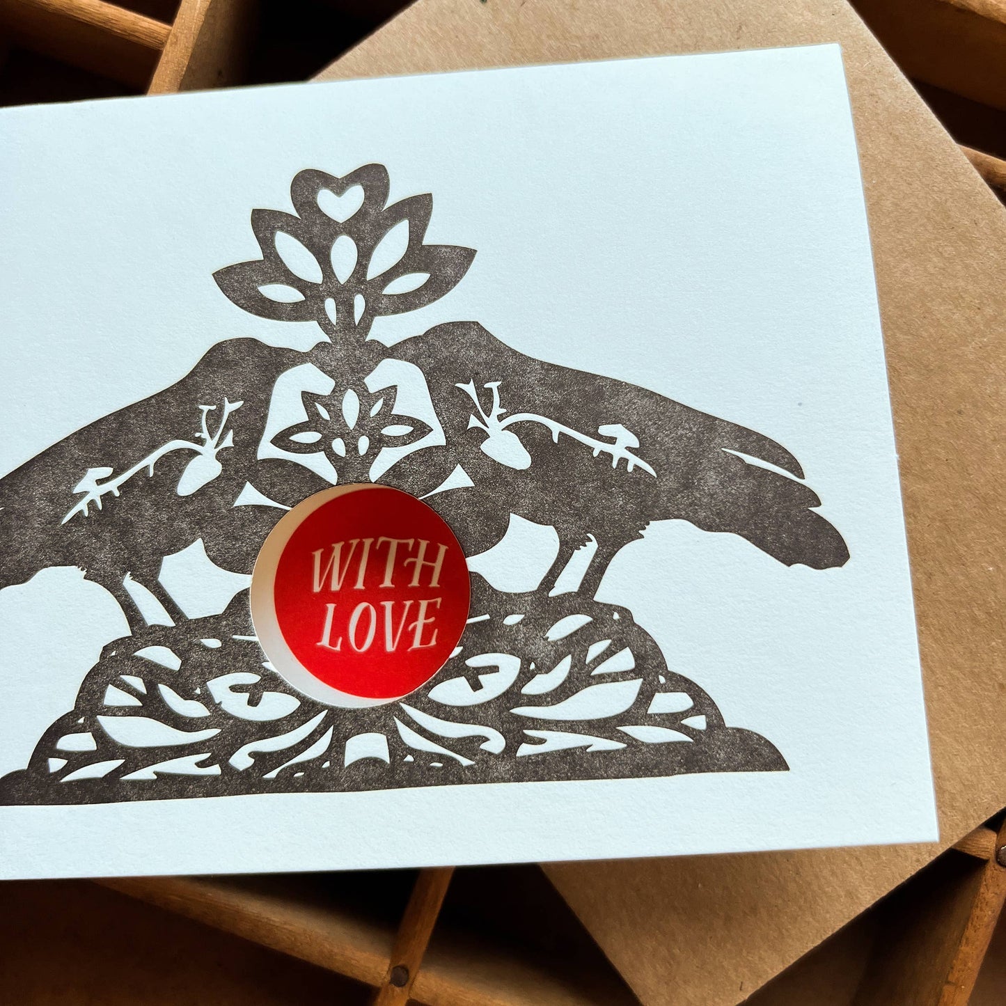 Lovebirds with love card