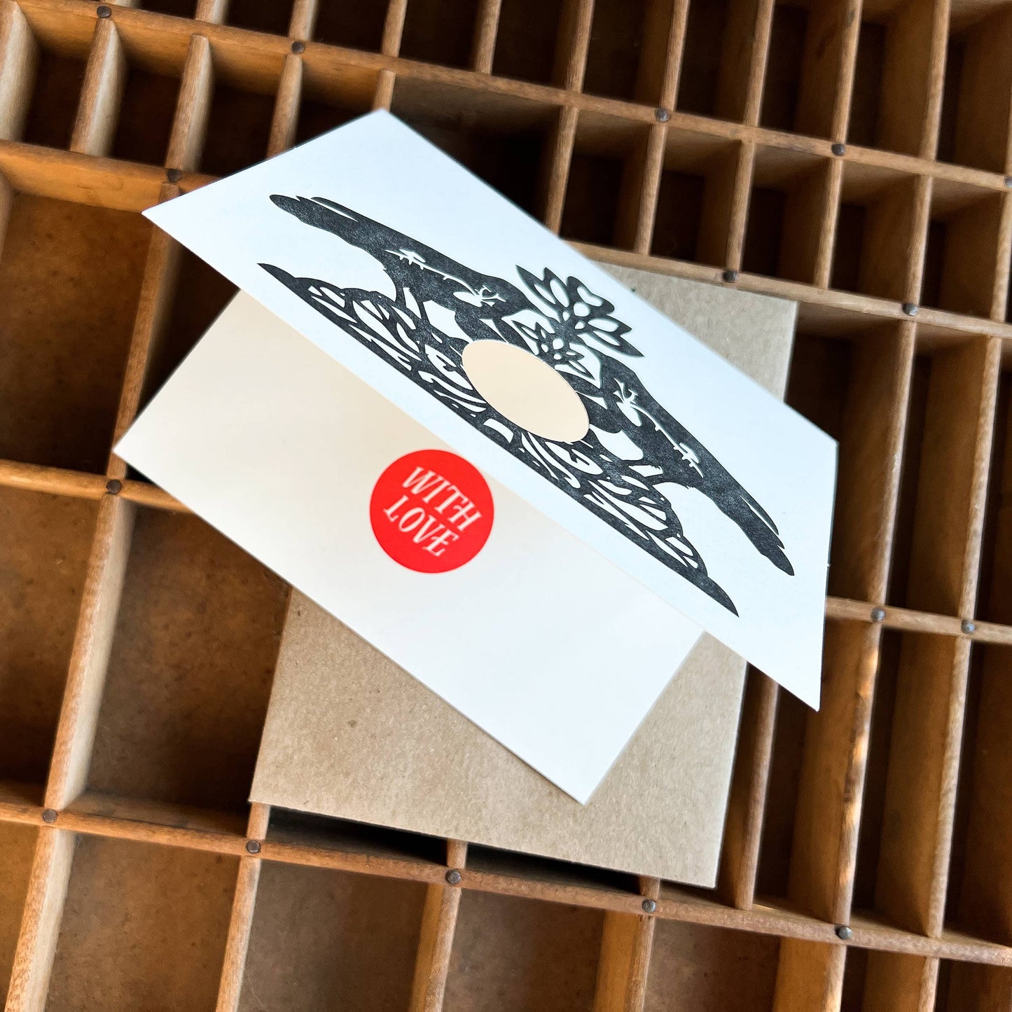 Lovebirds with love card